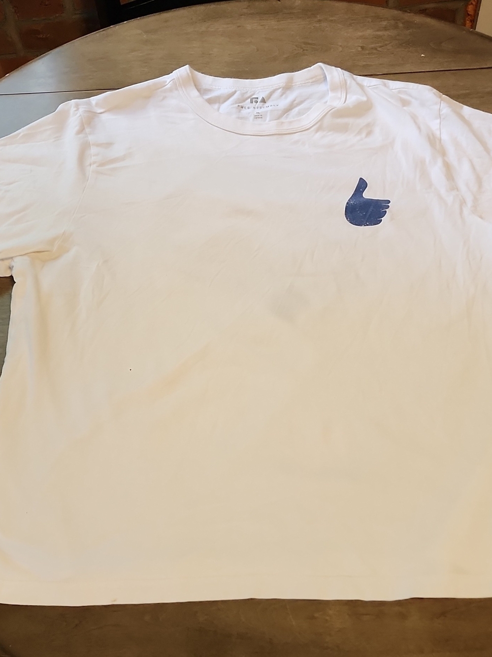 Men's White Crewneck Tee with Small Blue Thumbs-Up Graphic